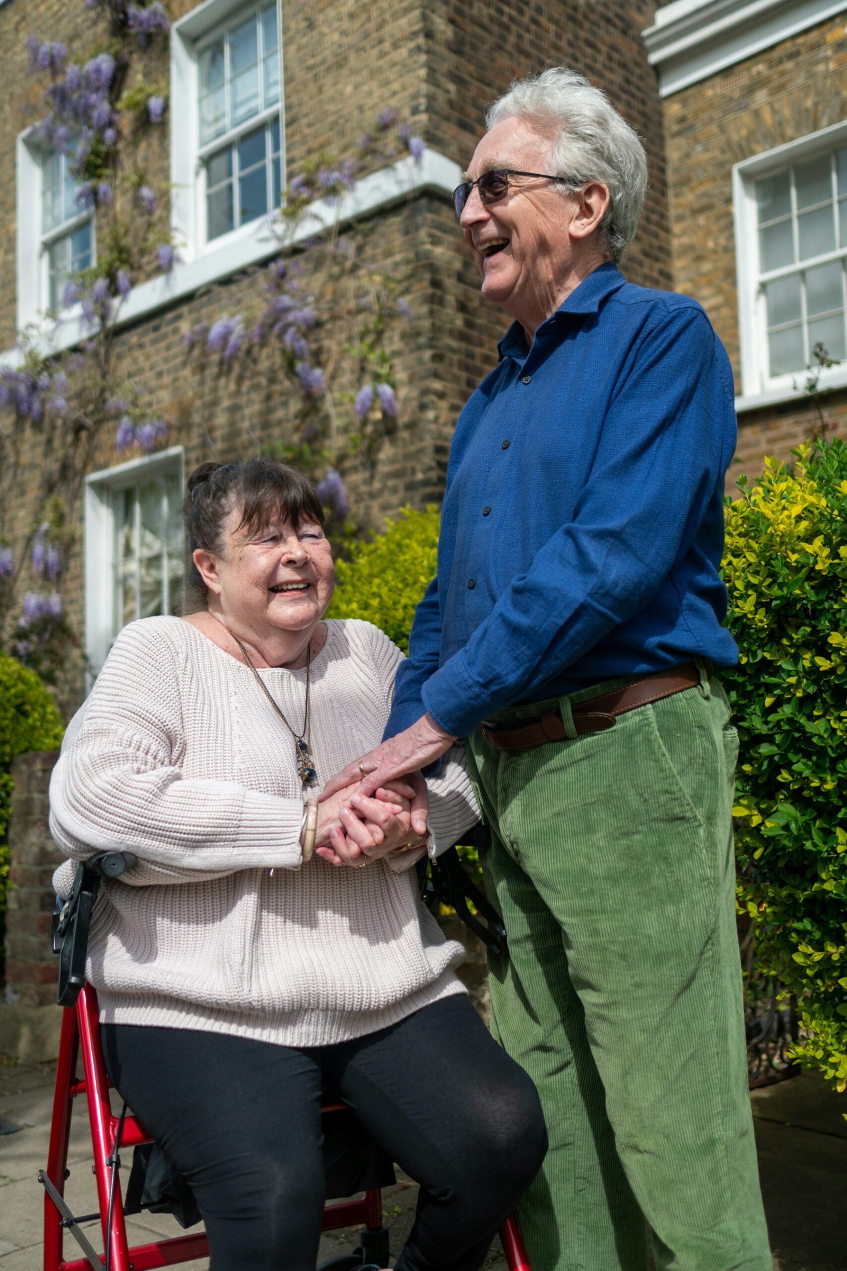 Older adults smiling together outdoors
